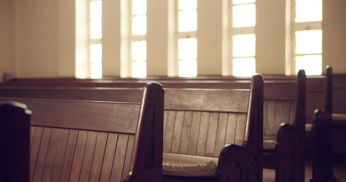 Chairs, church and religious building for worship or praise of God by spiritual christian religion and faith in a cathedral. Empty, wooden and seats for holy catholic baptism service in Europe