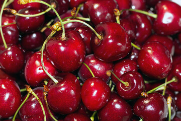 red appetizing cherry close up background