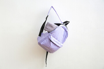 Lilac school backpack with pencil case on white background