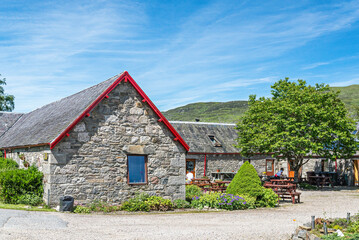 Fototapeta premium Cairngorm National Park and Dalwhinnie Distillery viewsduring a sunny day, Highlands, Scotland