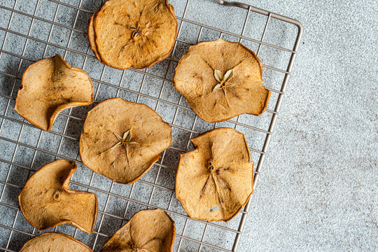 Slices of dried apples on oven tray