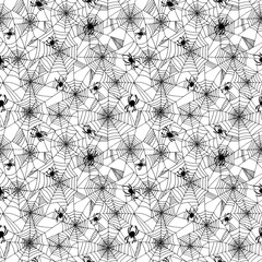 Hand drawn line art seamless halloween pattern with creepy spooky dreadful black spiders on cobweb on white background.Illustrated backdrop