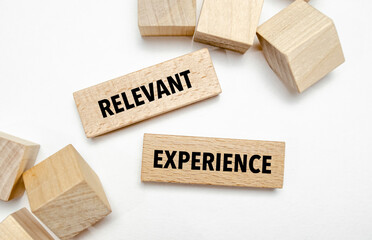 Text RELEVANT EXPERIENCE on wooden blocks. concept business succeed.