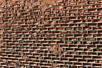 Brick wall along the side of a freeway in the Bronx in New York, USA