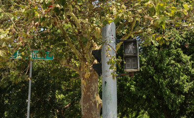 pedestrian traffic walking sign depicts city life, safety, and community, guiding people through bustling streets