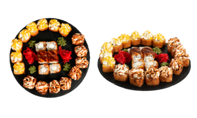 sushi set. different types of sushi on a big round black dish. Sushi set on a black slate.