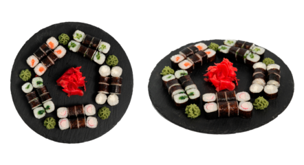 sushi set. different types of sushi on a big round black dish. Sushi set on a black slate.