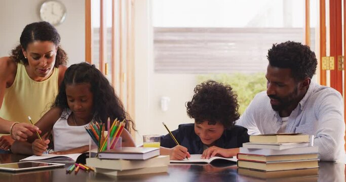 Family, homework and children with parents for help with learning, lesson and school project at home. Education, teaching and mother, father and kids writing, drawing and do activity for development