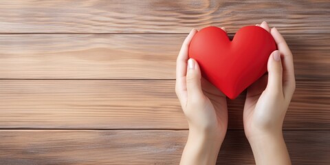 Young women hands holding red heart on wood background, health care, donate and family insurance concept, world heart day, world health day, CSR responsibility, adoption foster family, generative ai