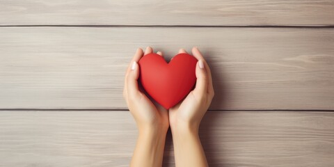Young women hands holding red heart on wood background, health care, donate and family insurance concept, world heart day, world health day, CSR responsibility, adoption foster family, generative ai