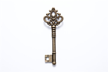 Brass key on a light plain background