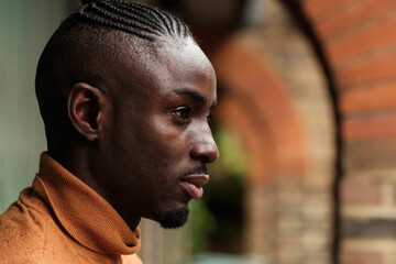 Portrait of black male model outside.