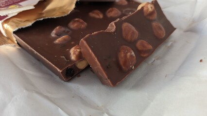 Chocolate bar for whole hazelnuts in foil