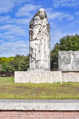 Fototapeta premium Rome, Italy - 26 Nov, 2022: Statue of San Catharina Da Siena near the Vatican City