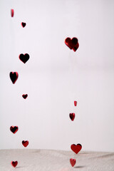 photo wall with red hearts on it