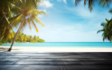 Wooden black table top on blur tropical beach background - can be used for display or montage your...