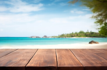 Fototapeta premium Wood table top on blur beach background - can be used for display or montage your products. High quality photo