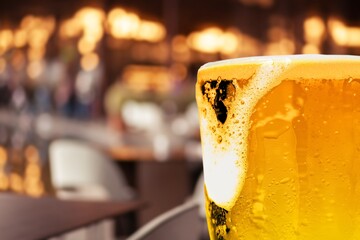 Two glasses with beer in bar, drink concept