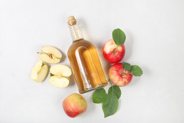 Apple cider drink, juice or fermented fruit drink and ingredients on a sunny table. Autumn banner. The concept of diet and weight loss. Healthy eating, body detoxification,