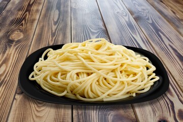 Tasty fresh pasta noodles on plate