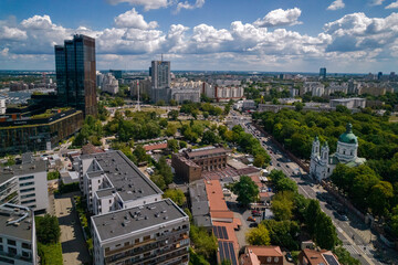 Fototapeta premium Drone, Warsaw city, sky, clouds, green, landscape, buildings, urban design, traffic, park, view, summer, blue