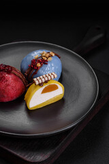 Delicious sweet colorful mochi desserts or ice cream with rice dough and toppings