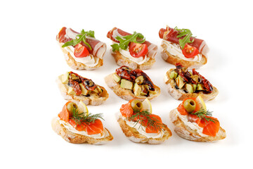 set of mini bruschette with salmon avocado and prosciutto on a white background for a restaurant website 1