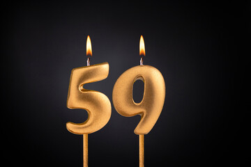 Birthday candle number 59 - Birthday celebration on black background
