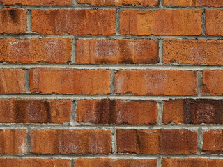 Red color brick wall texture. Rough surface. Background for design purpose.