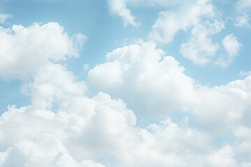 Naklejka na ściany i meble Clouds in s light blue sky