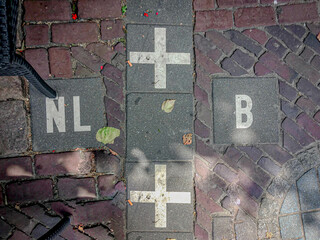Baarle-Nassau, White cross on the floor, The border between Belgium and Netherlands, The most complicated border in Europe, Bits of Belgium in the Netherlands (some buildings straddle both countries)