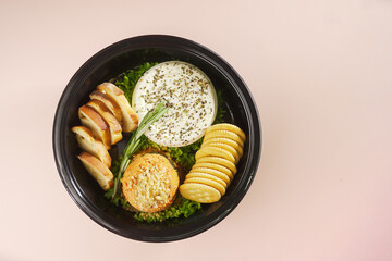 Artisanal Cheese Platter: A Delectable Assortment of Cheeses, Bread, and Crackers for Effortless Entertaining