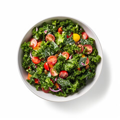 Top-down view of a bowl of kale salad isolated on a white background
