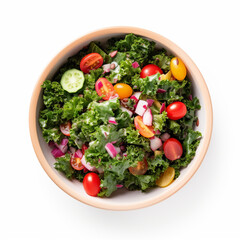 Top-down view of a bowl of kale salad isolated on a white background