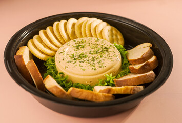 Savory Delights Platter: Tuna Pâté, Toasted Bread, and Gourmet Bites for the Ultimate Party Host
