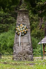 NIZKE TATRY, SLOVAKIA - AUGUST 15, 2020: Slovak National Uprising monument in Ludrovska dolina valley in Nizke Tatry mountains, Slovakia © Matyas Rehak