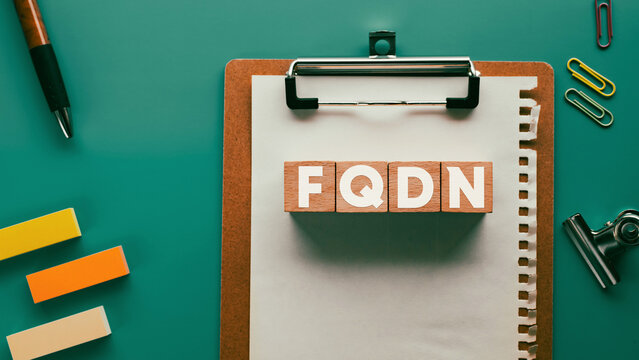 There is wood cube with the word FQDN. It is an abbreviation for Fully Qualified Domain Name as eye-catching image.
