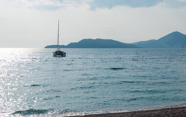 beautiful landscape in Montenegro. white yacht in the Adriatic Sea

