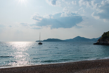 beautiful landscape in Montenegro. white yacht in the Adriatic Sea
