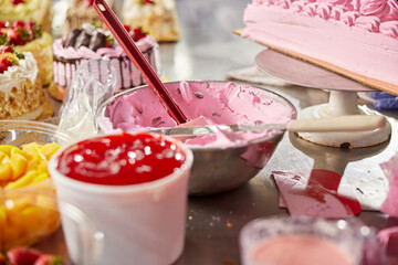 Detail of cake decorating station in bakery of grocery store 