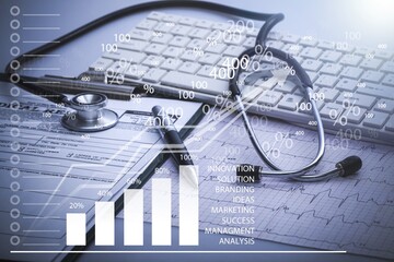 Healthcare business. Stethoscope and computer keyboard