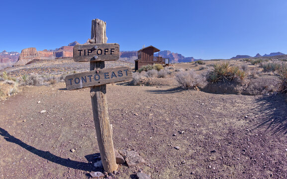 A sign marking the junction of the Tipoff Rest House and the Tonto East Trail at Grand Canyon Arizona.