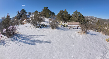 Picnic Hill along the Thumb Butte day use hiking trail in the Prescott National Forest just west of Prescott Arizona, covered in winter snow and ice.