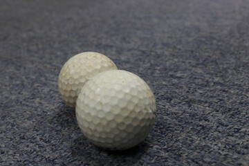Photo of a white golf ball on the practice field