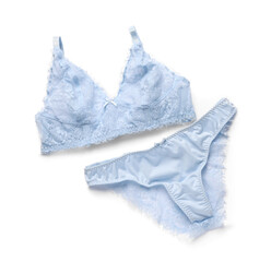 Elegant light blue women's underwear on white background, top view