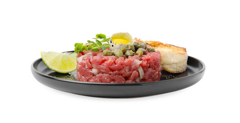 Tasty beef steak tartare served with quail egg, toasted bread and other accompaniments isolated on...