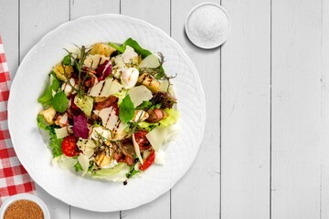 Tasty fresh salad with vegetables in plate