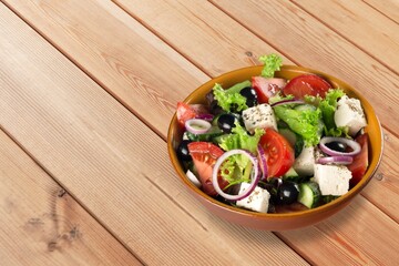 Tasty fresh salad with vegetables in plate