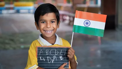 Foto op Plexiglas Portrait of Cute India Child or Kids celebrating Independence or Republic day of India © Govind