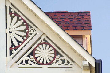 victorian triangle patterns architecture detail of a house roof gable with classic handicraft 